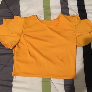 Yellow crop top with ruffles